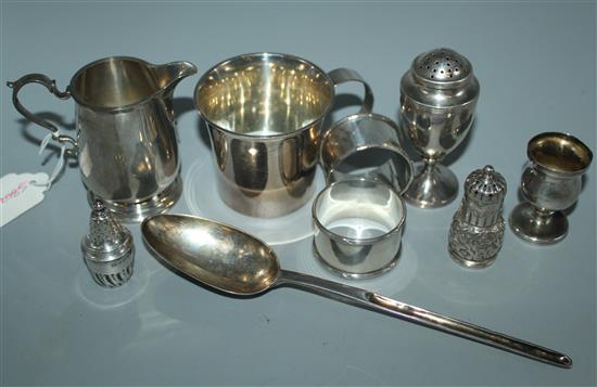 Silver mug, cream jug, trophy cup, pair of napkin rings, 3 condiments including George III pepperette, dish and tot